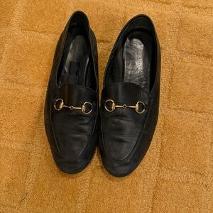 Gucci Black Leather Loafers with Gold Accents